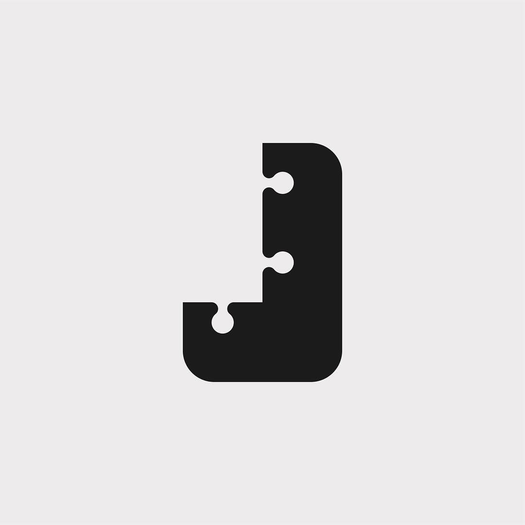 Creative typographic alphabet logos - J for Jigsaw