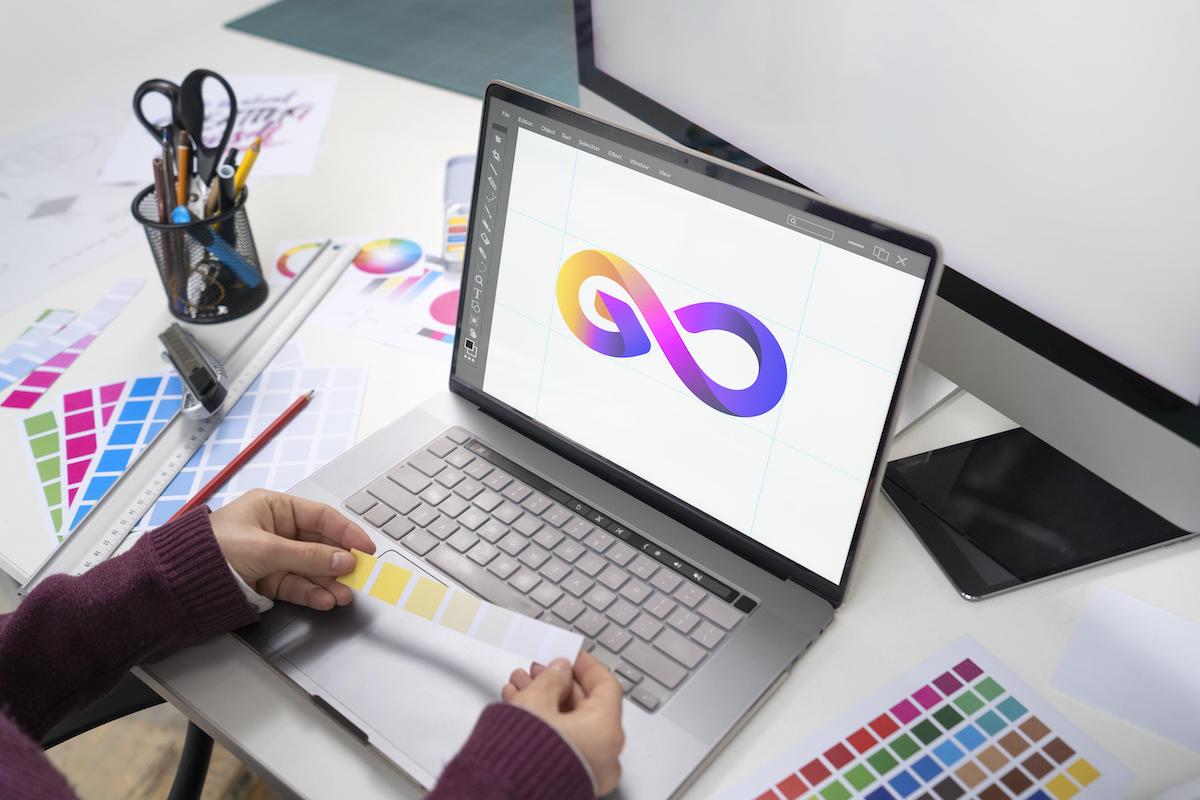 Graphic Designer working on laptop