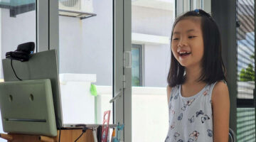 Young child participating in an engaging online learning session supported by personalized, AI-enhanced teaching tools.