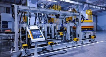 Automated industrial production line inside a modern manufacturing facility