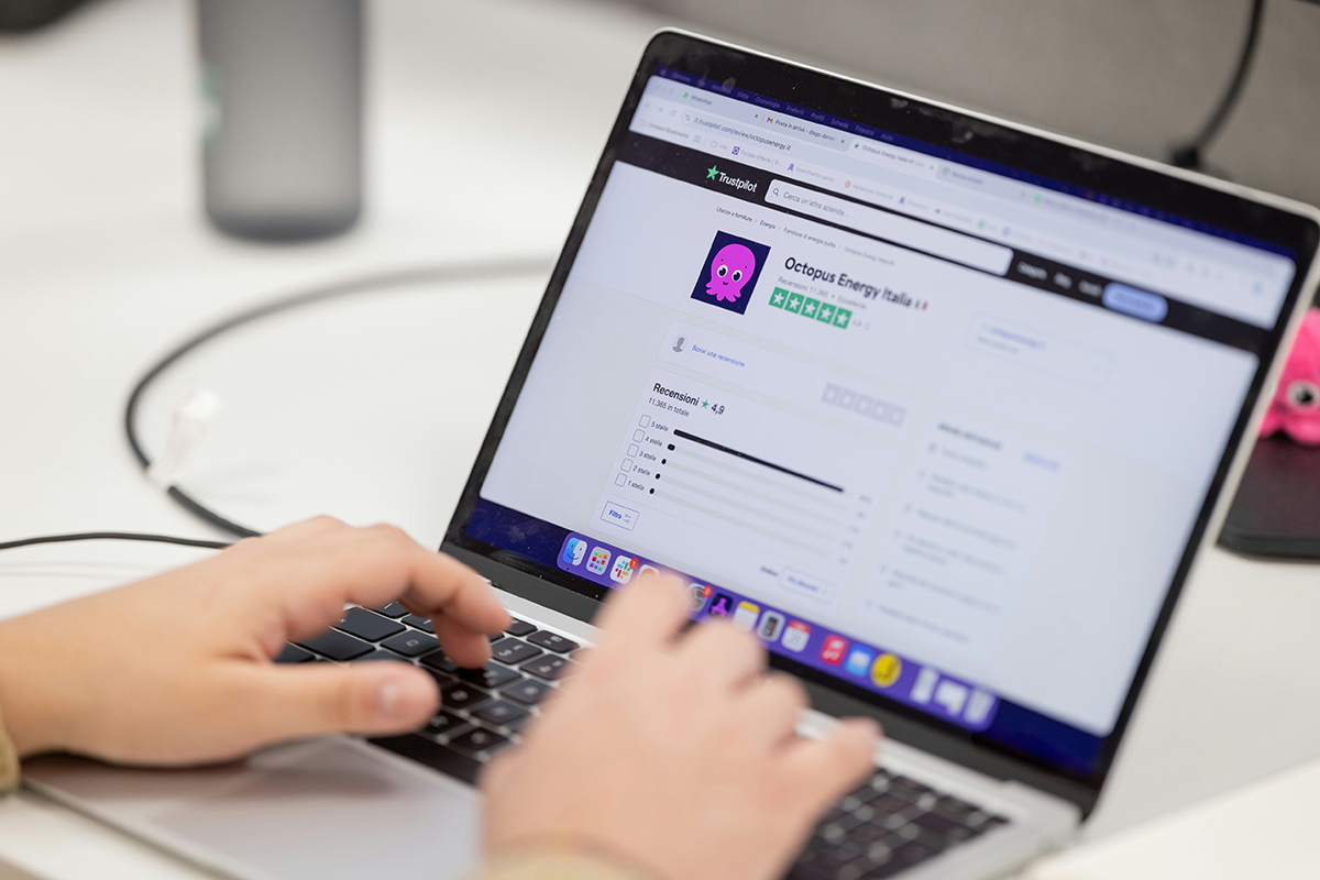 Person browsing customer reviews on a laptop