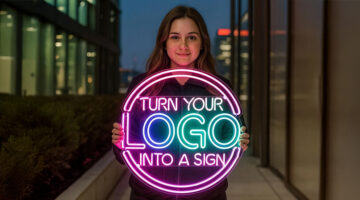 Person holding a colorful custom neon sign design
