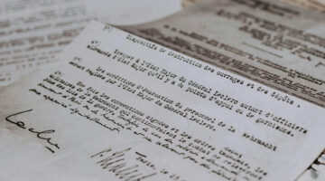 Scanned paper documents demonstrating OCR PDF text recognition technology