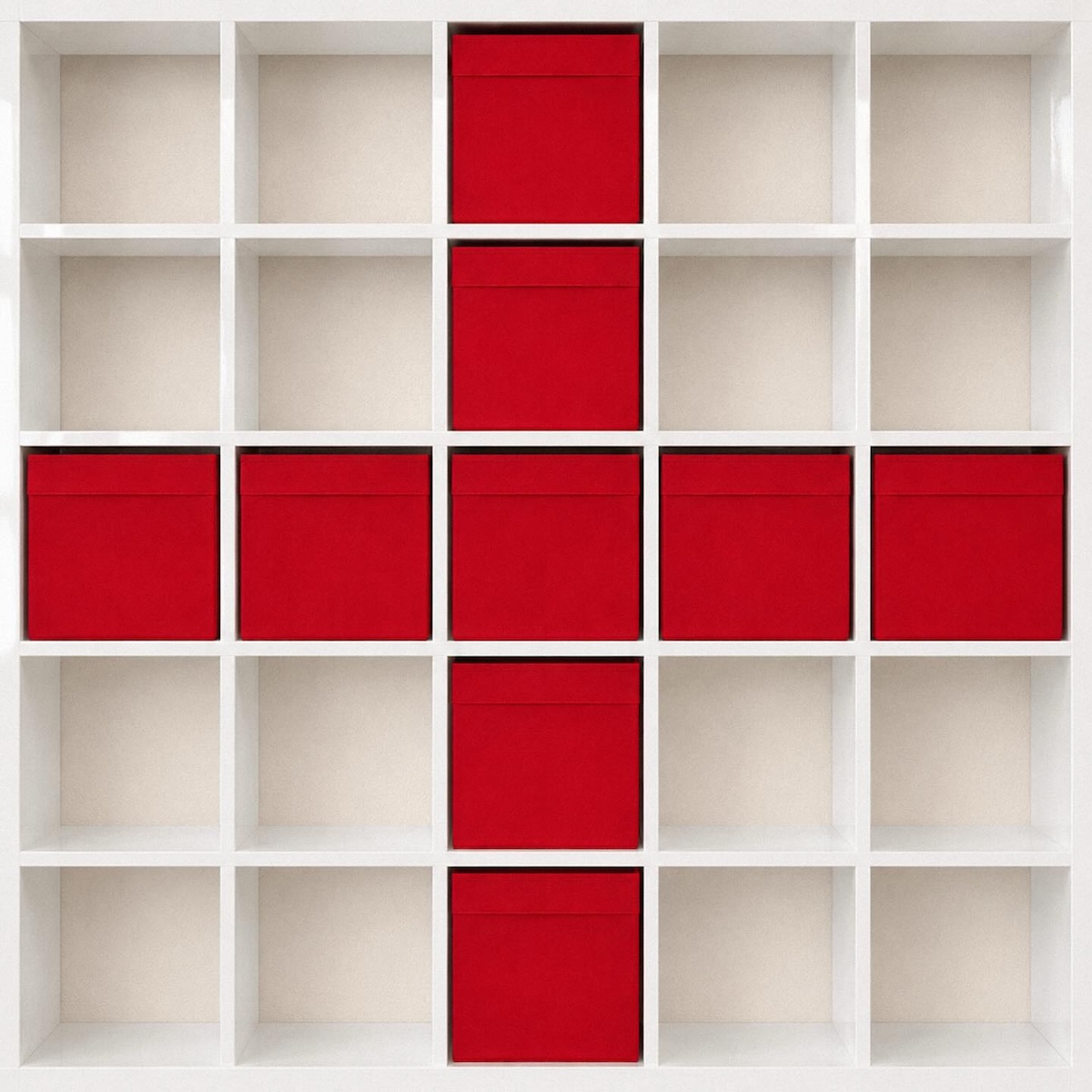 England flag recreated with red storage boxes arranged as a cross inside a white KALLAX shelving unit