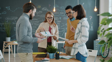 Creative team collaborating on design and marketing strategy